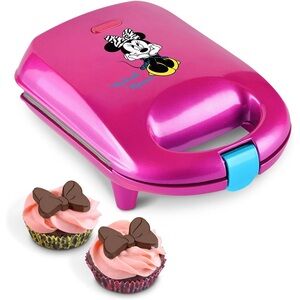 Disney Minnie Mouse Mini Cupcake Maker. Liners and silicone bow mold included.